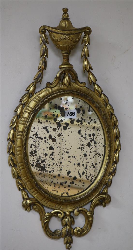 A late 18th/early 19th Century gilt wall mirror W.30cm